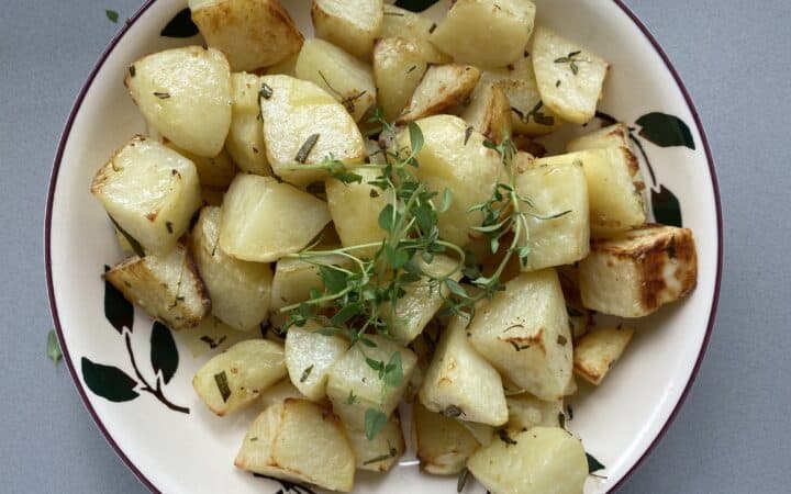 Herb Baked potatoes in a dish